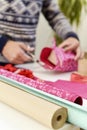 Young man wrapping a gift Royalty Free Stock Photo