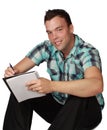 Young man writing Royalty Free Stock Photo