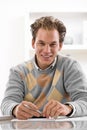 Young man writing at desk Royalty Free Stock Photo