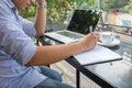 Young man writing notes Royalty Free Stock Photo