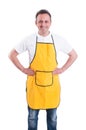 Young man with yellow apron posing confident Royalty Free Stock Photo