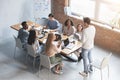 Young manager speeking at morning briefing in office Royalty Free Stock Photo