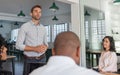 Manager and his staff having a meeting in an office Royalty Free Stock Photo