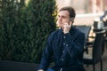 The young manager working on a laptop in the park. Lunch Break. Royalty Free Stock Photo