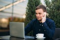 The young manager working on a laptop in the park. Lunch Break. Royalty Free Stock Photo