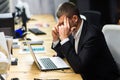 Young manager at the workplace. Young man working on computer in office