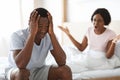 Young married african american couple fighting in bedroom Royalty Free Stock Photo
