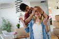 Young married couple with boxes and holding flat keys Royalty Free Stock Photo