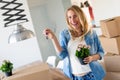 Young married couple with boxes and holding flat keys Royalty Free Stock Photo