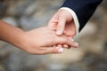 Young married couple holding hands, close-up. Marriage concept Royalty Free Stock Photo