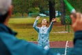 Young married couple: a man and a girl play badminton outdoors. Royalty Free Stock Photo