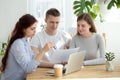 Young married couple at meeting with architect Royalty Free Stock Photo