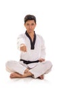 Young martial artist in lotus pose with one punch Royalty Free Stock Photo