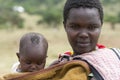A young Masai mother with her baby.