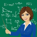 Young math teacher standing next to blackboard Royalty Free Stock Photo