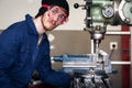 Young Mechanic Apprentice On Milling Machine