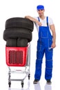 Young mechanic shopping tires Royalty Free Stock Photo