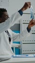 Young medic receiving x ray on desk from nurse