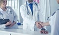 Young medical doctor people handshaking at office Royalty Free Stock Photo