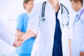 Young medical people handshaking at office Royalty Free Stock Photo