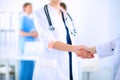 Young medical people handshaking at office Royalty Free Stock Photo