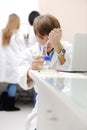 Young medical scientist working in modern lab