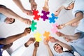 Young Medical Team Solving Jigsaw Puzzle Royalty Free Stock Photo