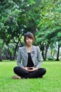 Young meditation woman in nature