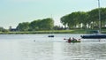 Young Men Canoeing in the Lake Royalty Free Stock Photo