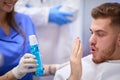 Young man in a dentistÃ¢â¬â¢s office