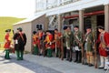 Young men dressed as soldier`s waiting for orders during reenactments, Fort Ontario, New York, 2016