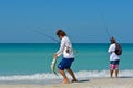 Local Young Men Fishing from Beach