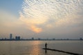 Young men fishing on West lake (Ho tay) Royalty Free Stock Photo