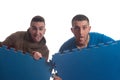 Young Men Holding Blue Mat Puzzle Royalty Free Stock Photo