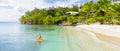 young men in kayak at a tropical island in the Caribbean sea, St Lucia or Saint Lucia Royalty Free Stock Photo