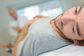 young man at physio therapy with pain Royalty Free Stock Photo