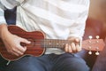 Young men are playing guitar for fans to listen to in restaurants. Royalty Free Stock Photo