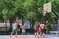 Young Men Playing Pickup Basketball