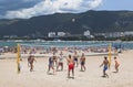 Young men playing volleyball on the sandy beach of the resort Gelendzhik, Krasnodar region Royalty Free Stock Photo