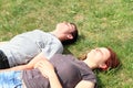 Couple of lovers lying on meadow Royalty Free Stock Photo