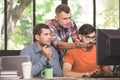 Young men programmers working together in the office Royalty Free Stock Photo