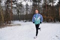 Young men running in winter