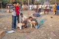 young men selling small goats, animal babies at the Meena Bazaar in Delhi. . Jama Masjid is the principal mosque of Old Delhi in