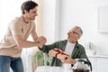 young man shaking hands with happy Royalty Free Stock Photo