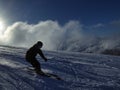 Young men skiing in the Swiss mountains at Davos Klosters Switzerland at ski slope on Jakobshorn Royalty Free Stock Photo