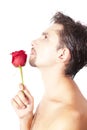 Young men smell the red rose Royalty Free Stock Photo