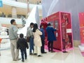 Shenzhen, China: young men and women are getting free cosmetics samples.