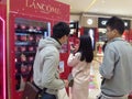 Shenzhen, China: young men and women are getting free cosmetics samples.