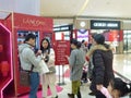 Shenzhen, China: young men and women are getting free cosmetics samples.