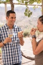 A young man and woman having bread and wine Royalty Free Stock Photo